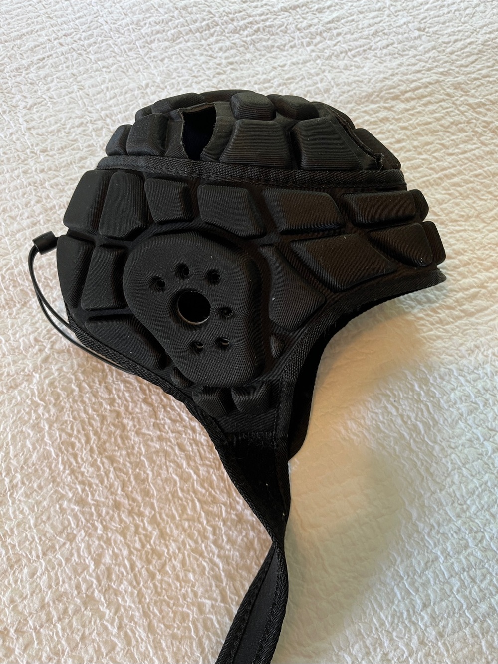 Men’s Large Flag football padded helmet.